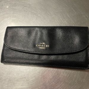 Selling a coach black authentic slim wallet